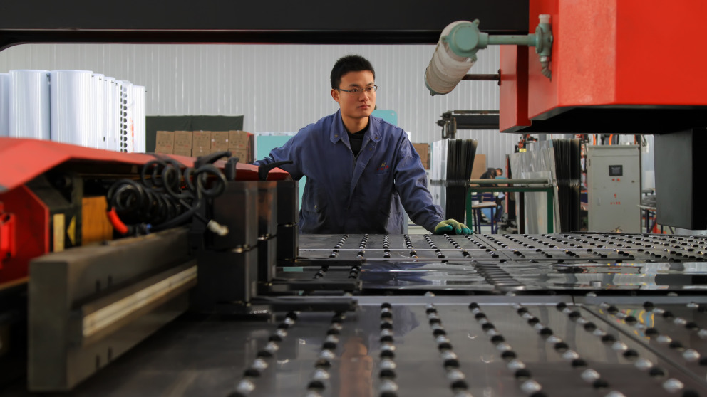 machine tool worker solar industry China